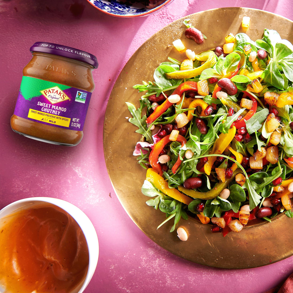 Patak's Sweet Mango Chutney on a cheese board for a tasty pairing.