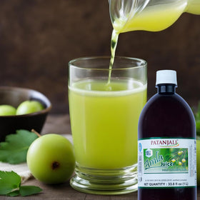 Patanjali Amla Juice packaging close-up, sturdy 1L container for households.