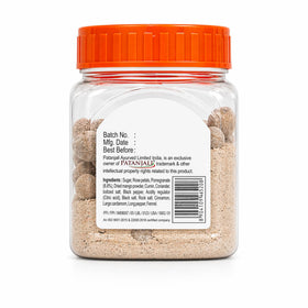 Patanjali Pachak Anardana Goli tablets close-up in container