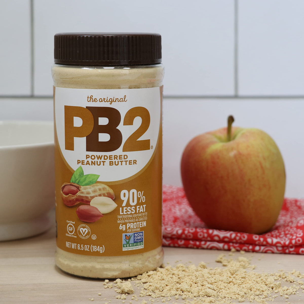 PB2 Chocolate jar beside fruit, dessert-friendly chocolate option