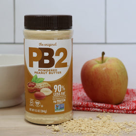 PB2 Chocolate jar beside fruit, dessert-friendly chocolate option