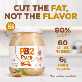 PB2 powder with scoop ready to mix into shakes or recipes.