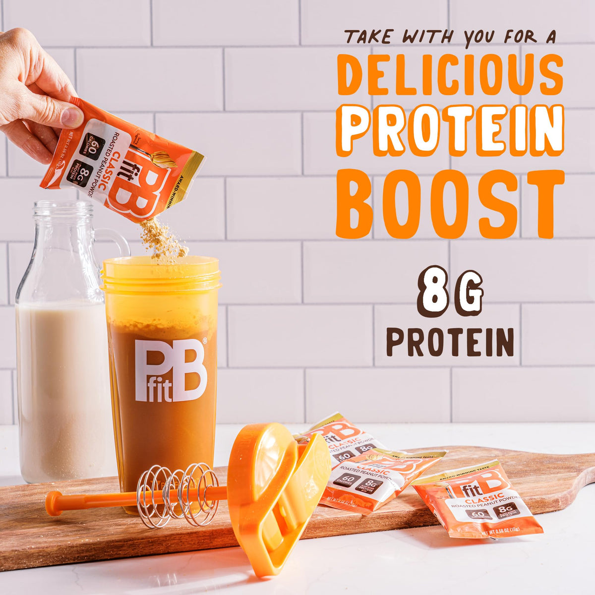 PBfit Classic peanut butter powder being stirred into a smoothie.
