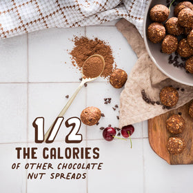 PBfit Cocoa Peanut Butter Powder stirred into a smoothie for flavor and protein