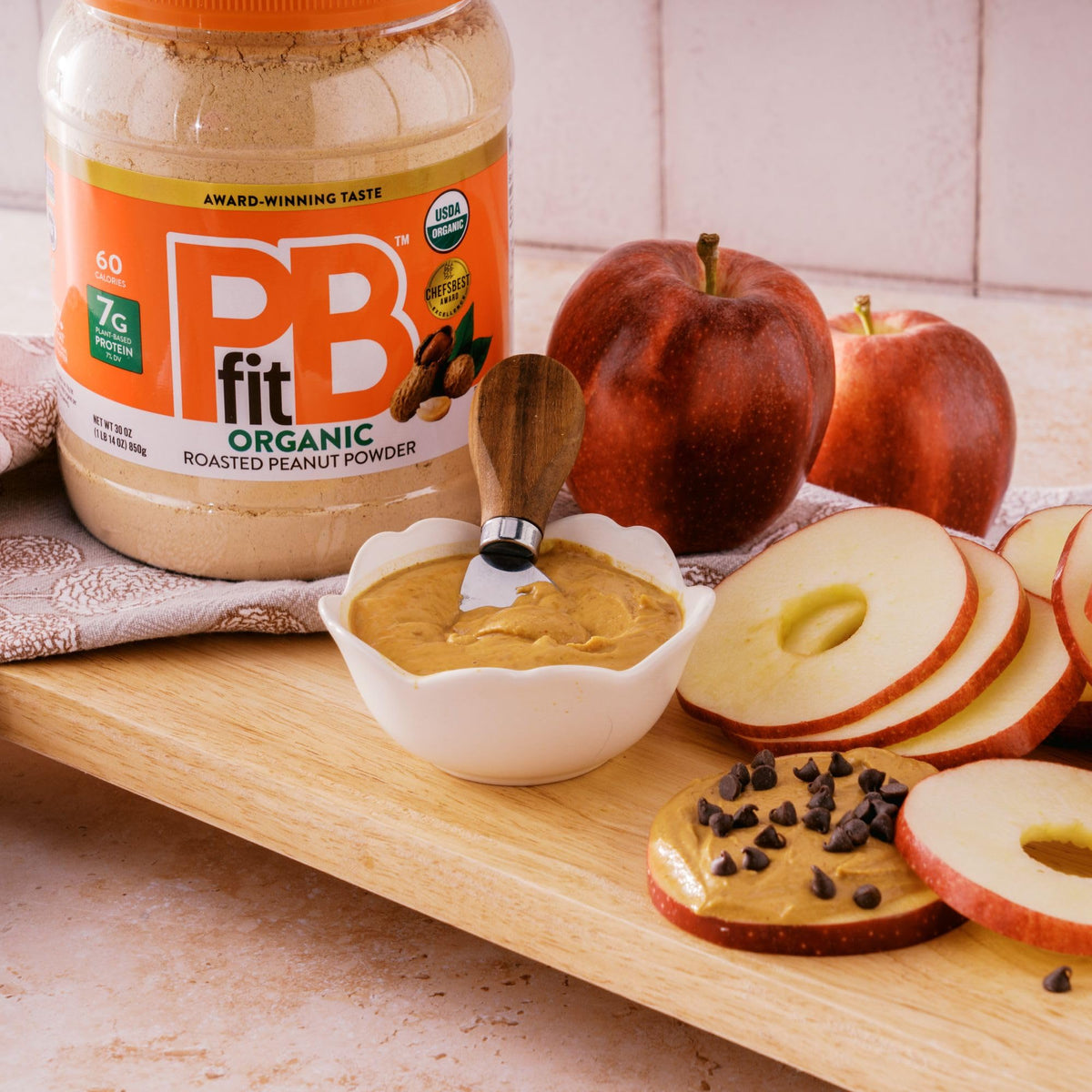 PBfit ingredients image shows organic peanuts and coconut sugar for clean flavor.