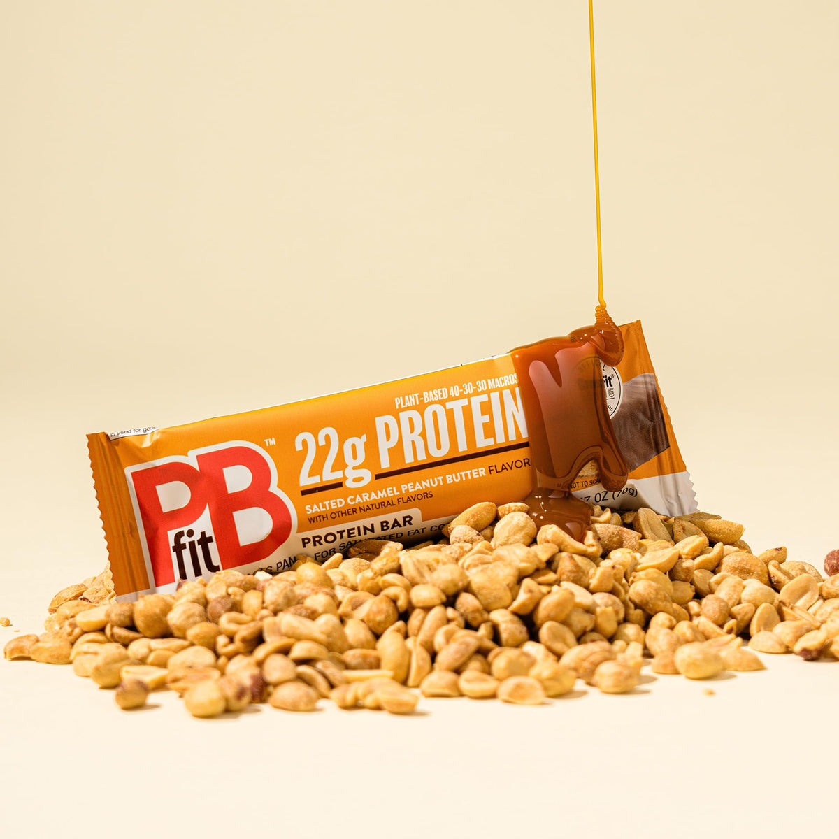 PBfit bar close-up showing creamy peanut butter and salted caramel flavor