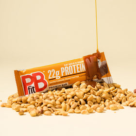 PBfit bar close-up showing creamy peanut butter and salted caramel flavor