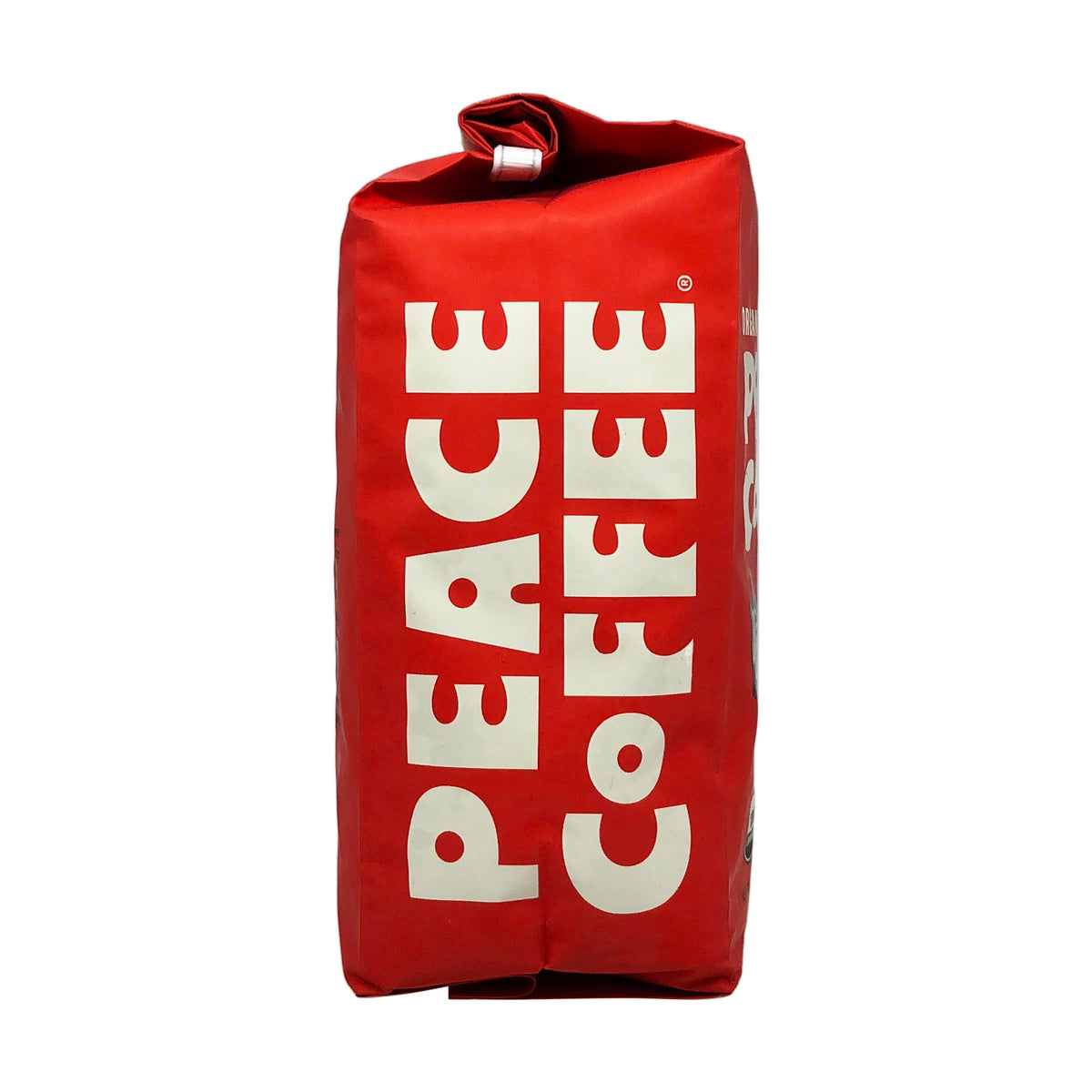 Peace Coffee Birchwood ground coffee ready for a rich, aromatic brew in a mug.