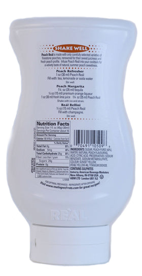 PEACH REÀL label closeup—natural peach infusion for premium sweetness.