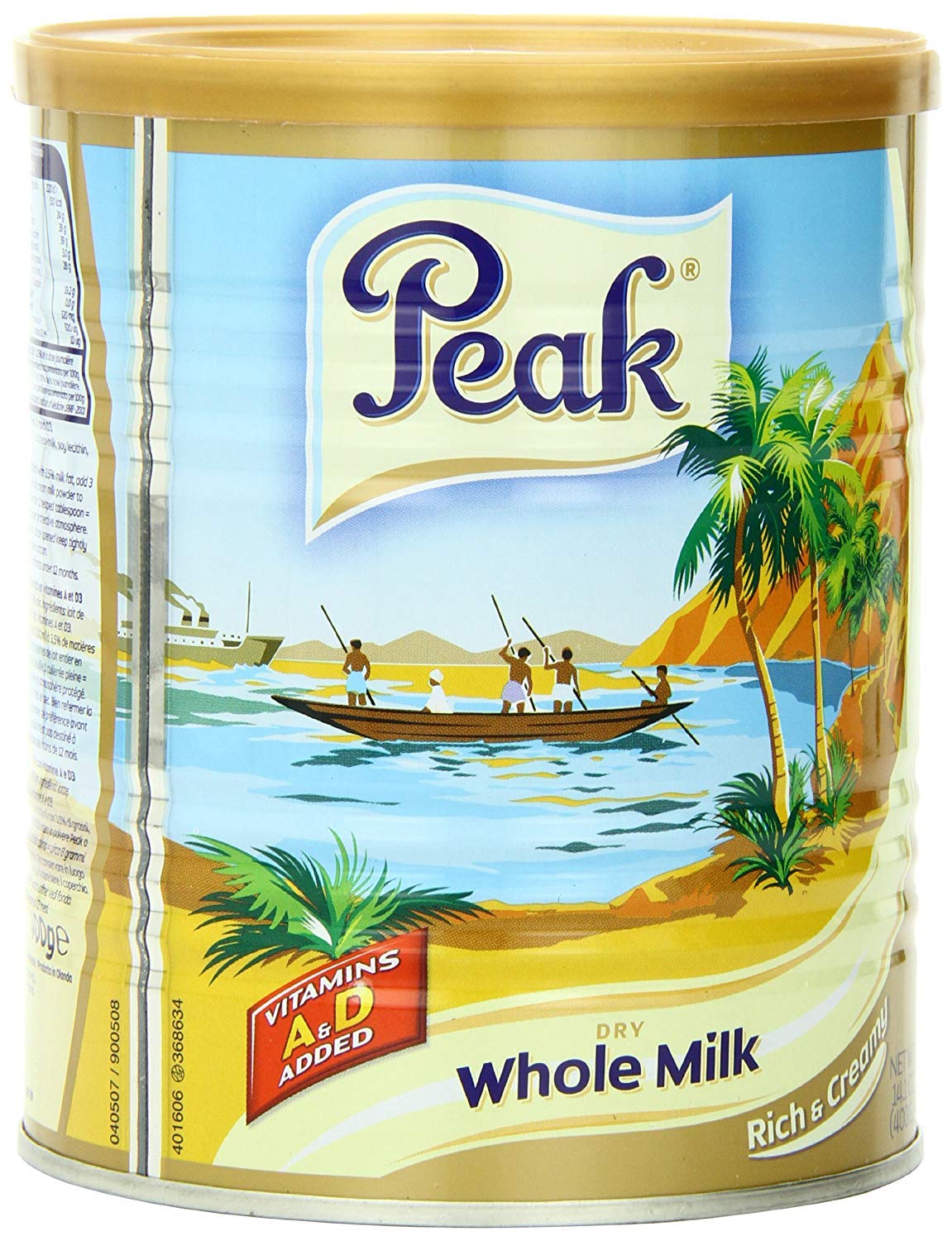 Peak Milk Powder 400g being poured into a glass for a creamy drink