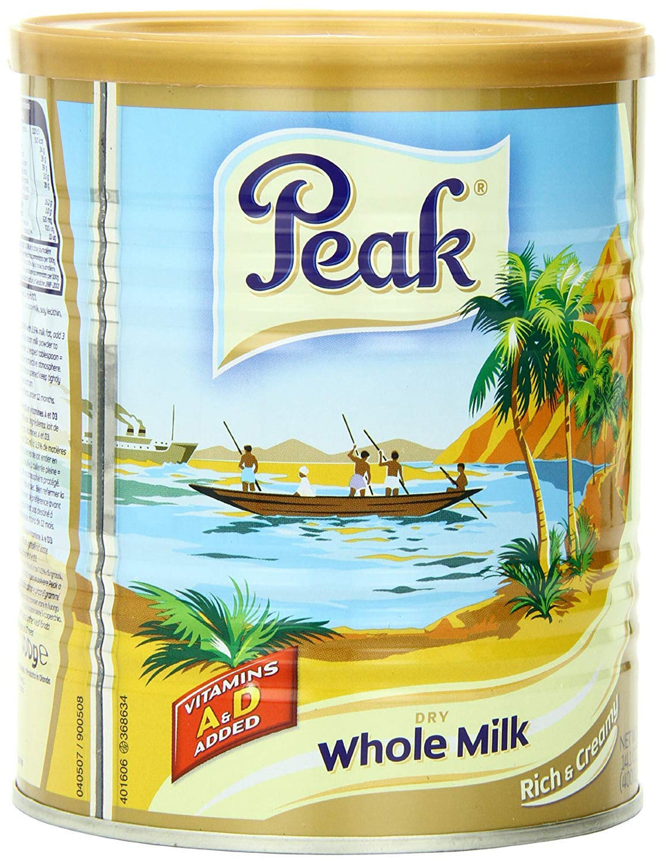 Peak Milk Powder 400g being poured into a glass for a creamy drink