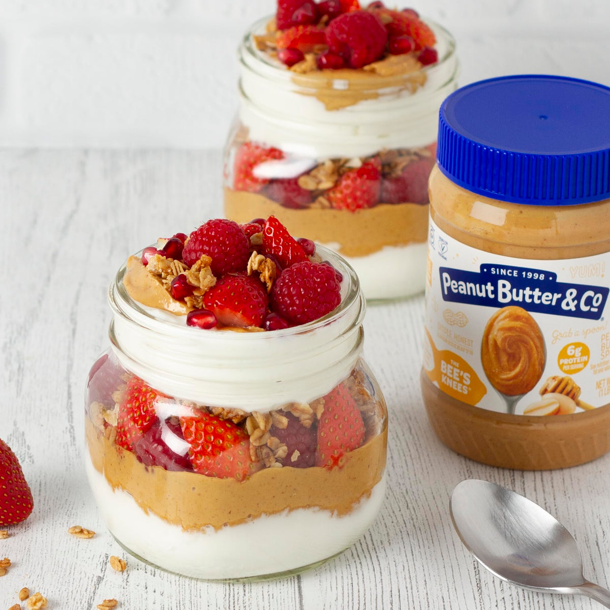 Peanut Butter & Co. The Bee’s Knees parfait topping idea with yogurt and berries.
