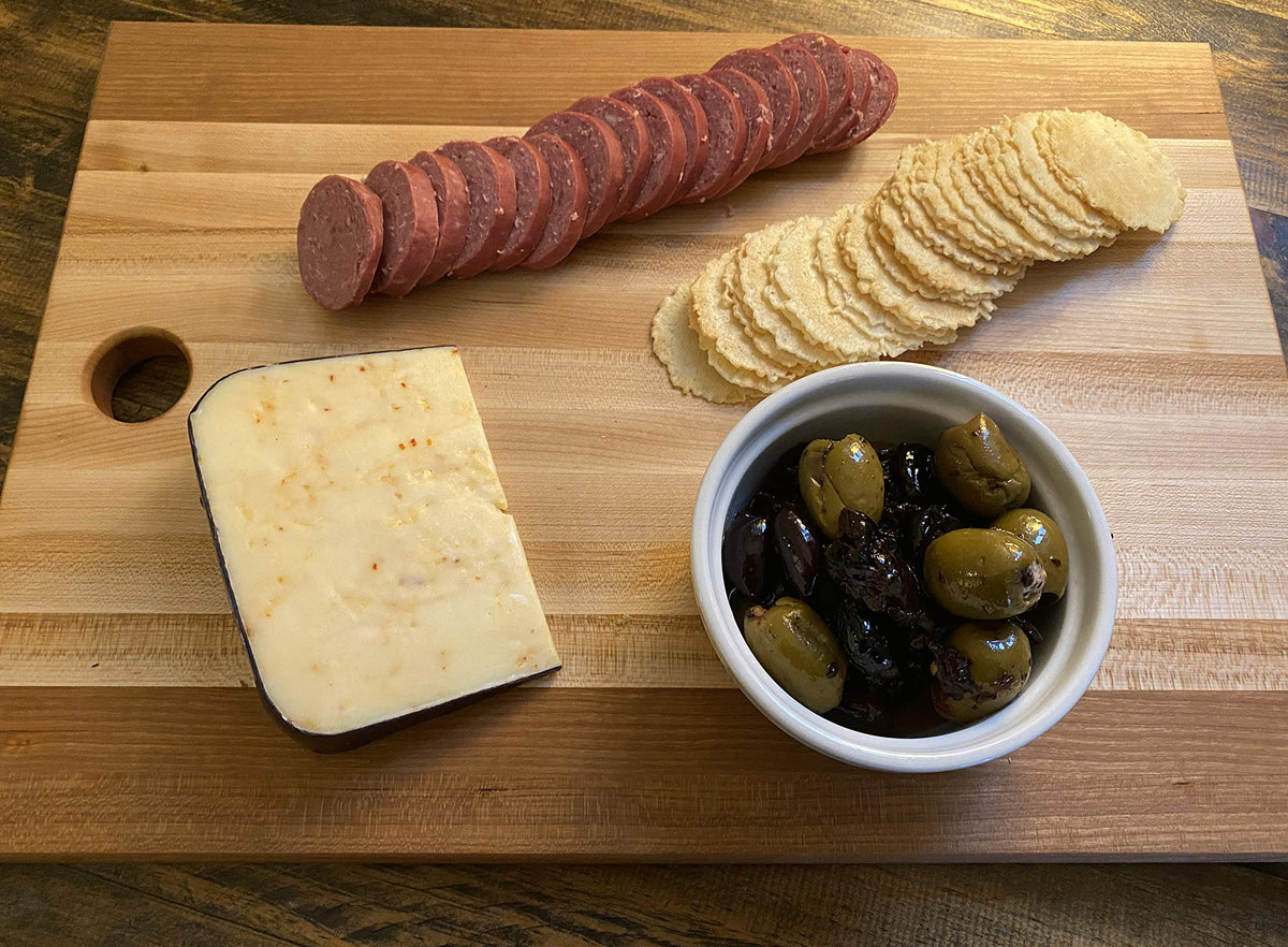 Pearson Ranch Venison Summer Sausage in a pasta dish for smoky depth.