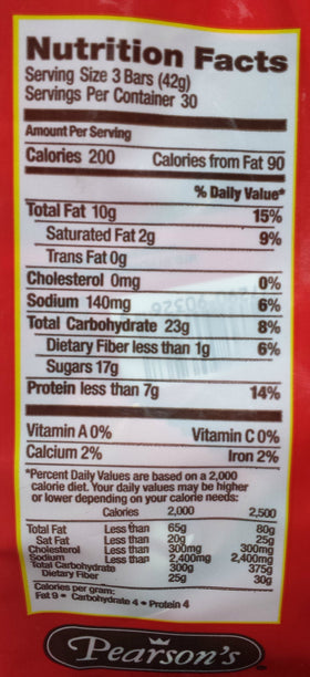 Close-up of Pearson's Salted Nut Roll bites highlighting crunchy, chewy texture ideal for quick snacks.