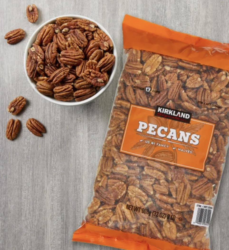 Pecan halves prepared for desserts and baking with a rich, nutty aroma.