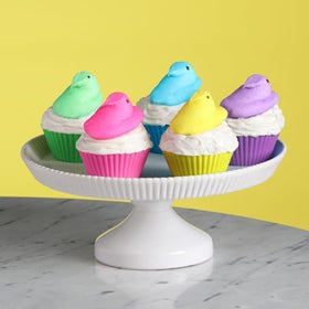 Peeps yard egg hunt scene featuring bright wrappers and treats