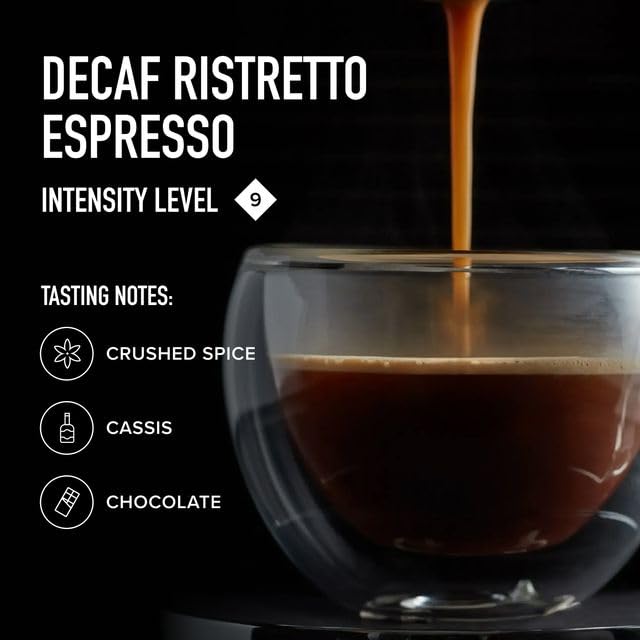 Capsules in a cup ready for a ristretto pull with rich crema