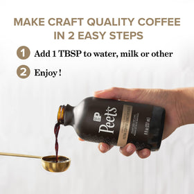 Steaming cup of hot coffee made with Ultra Coffee Concentrate, emphasizing all-day versatility.