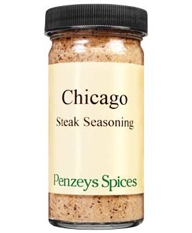 Penzeys Chicago Steak Seasoning jar ready to flavor steaks and grilled vegetables.