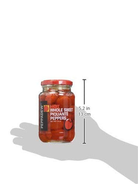 Peppadew Juanita peppers in glass jar close-up, gluten-free and vegan-friendly.