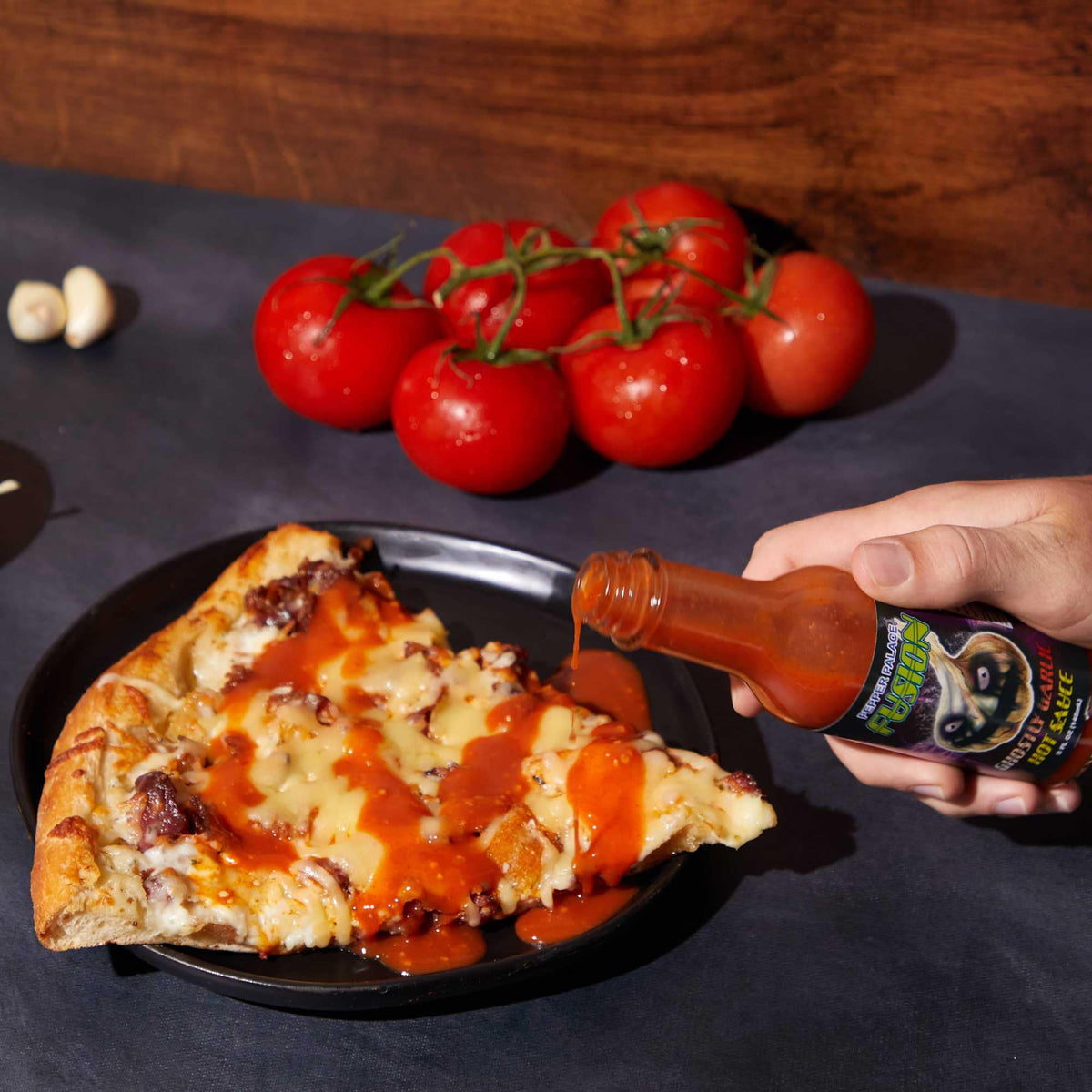 Pepper Palace Ghostly Garlic Fusion on a pizza for a spicy garlic lift