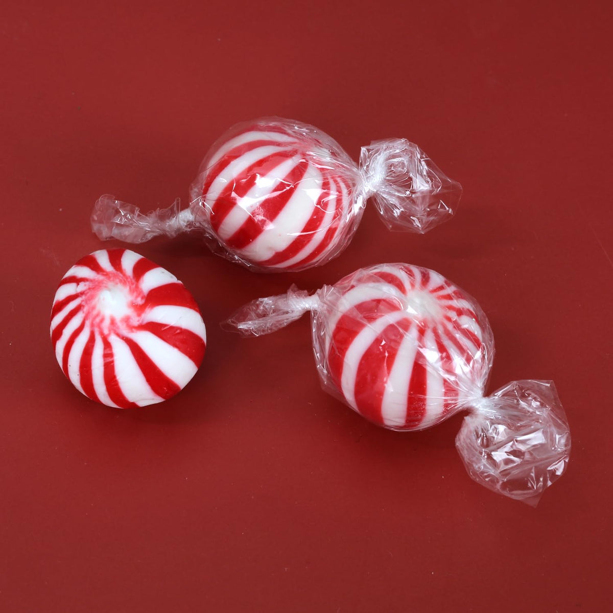 Peppermint candy balls red white swirl pack on counter for fresh treats