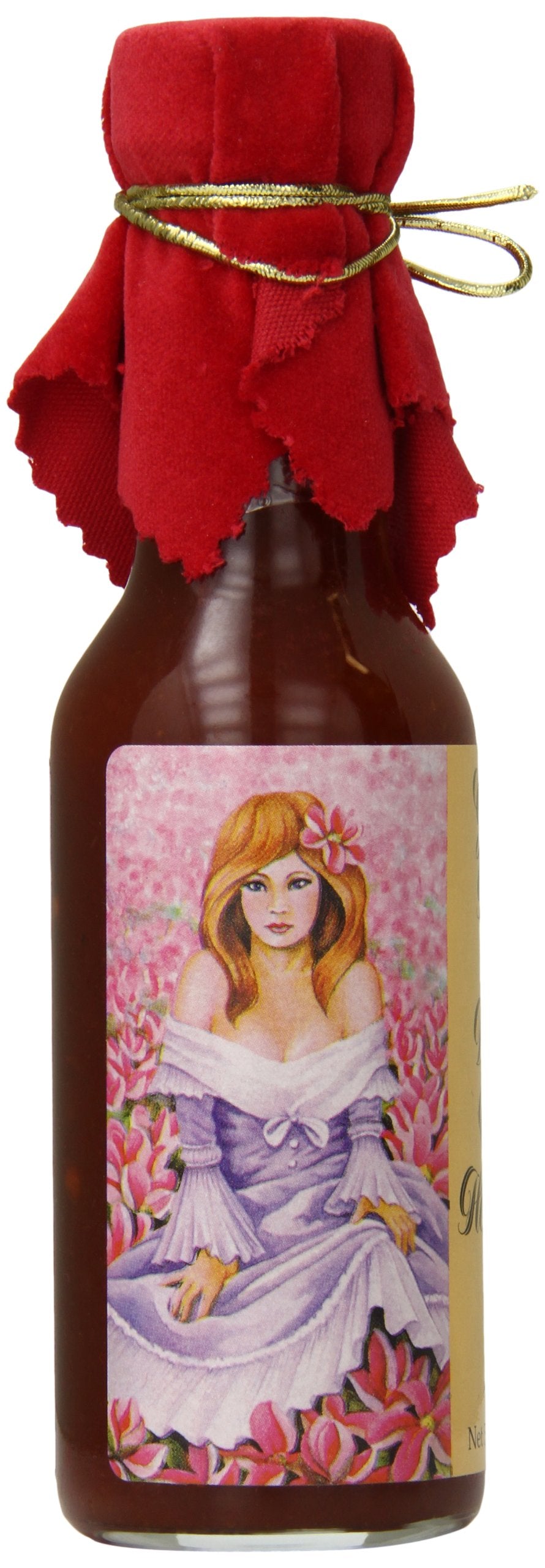 Pepper's Georgia Peach and Vidalia Onion hot sauce bottle on wings with red velvet top.