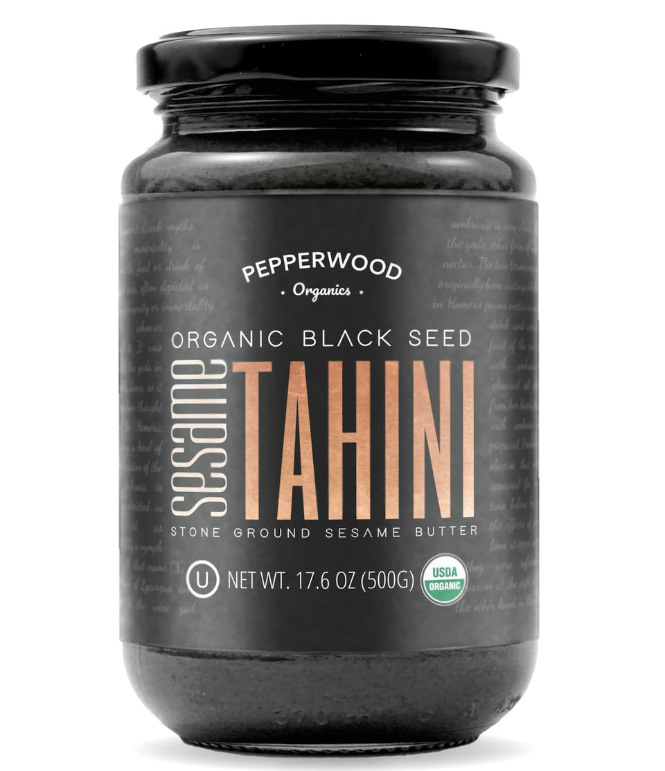 Pepperwood Organics black sesame tahini jar front showcasing pure, organic paste for spreads.