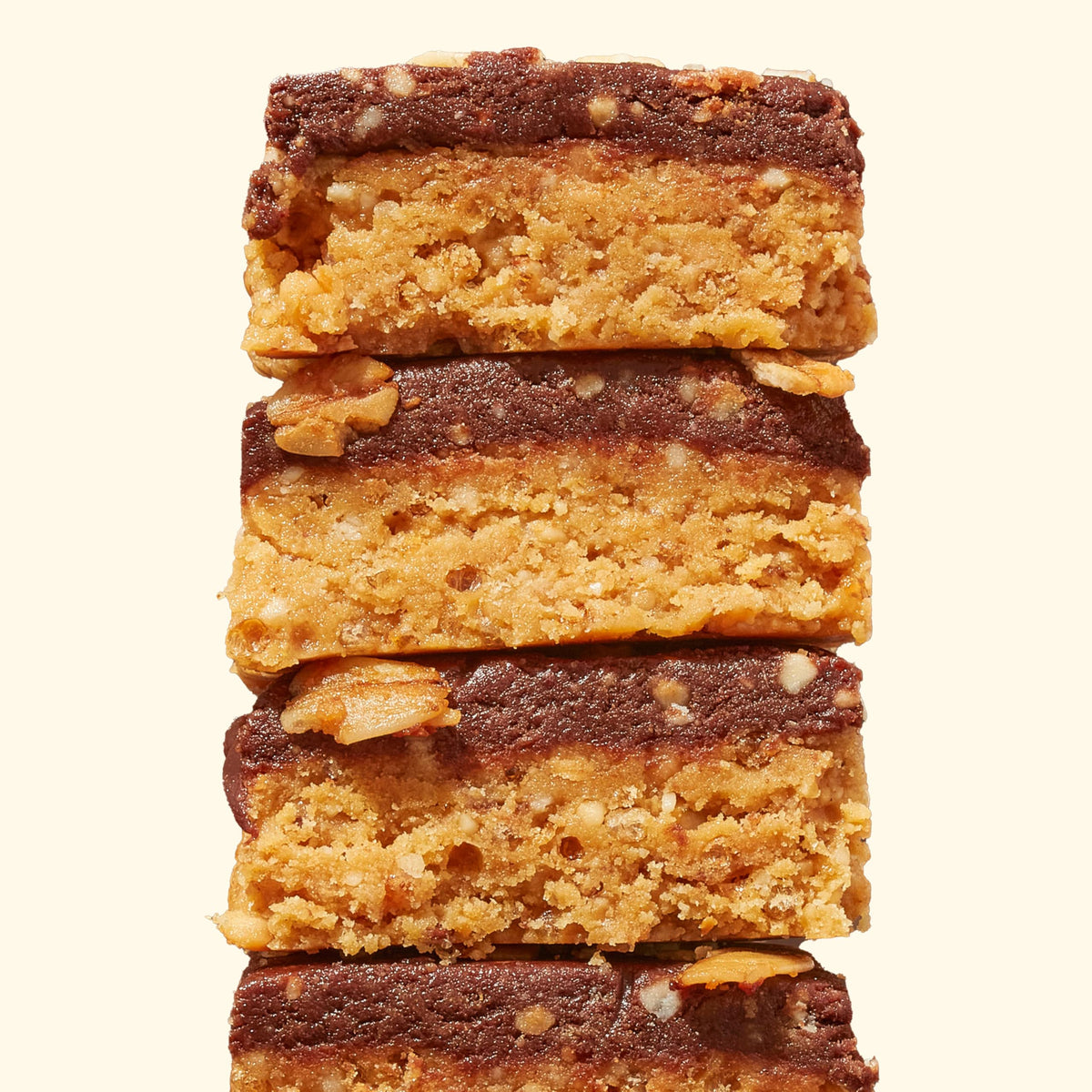 Perfect Bar Choco Crisp bite shot highlighting creamy nut butter and chocolate layer.
