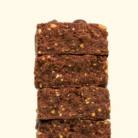 Perfect Bar Chocolate Brownie Bar close-up emphasizes cookie dough texture and nut butters