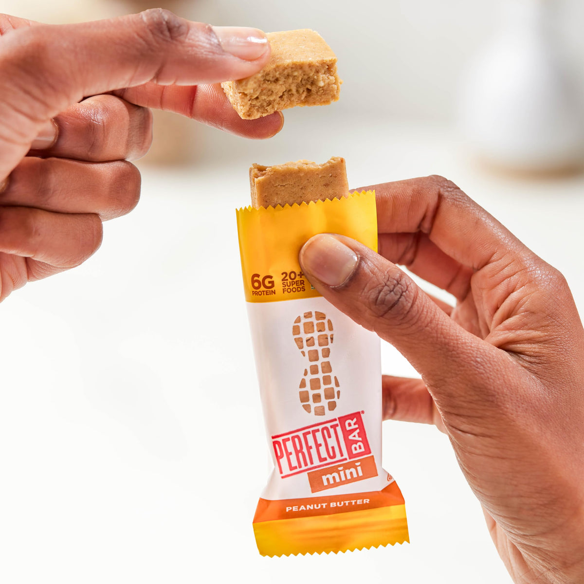 Gluten-free and soy-free badge on Perfect Bar Mini for allergy-conscious choices.