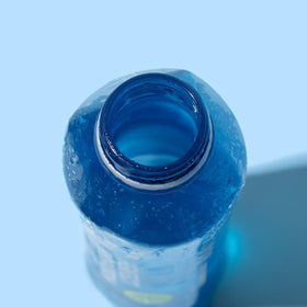 Perfect Hydration 9.5+ pH bottle on kitchen counter for daily refreshment.