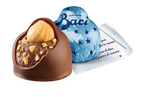 Perugina Baci pralines close-up, highlighting hazelnut center and smooth chocolate for gifting or sharing.