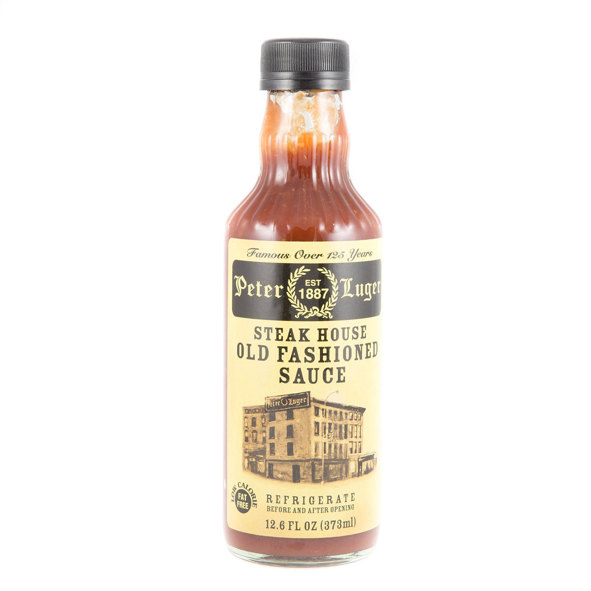 Peter Luger steak sauce bottle ready to pour, versatile for steak, burgers, and chicken.