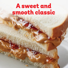 Peter Pan Crunchy Peanut Butter spread on toast showing easy spread with crunch.