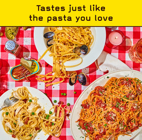 Cooked spaghetti on plate featuring Pete’s Pasta, Italian flavor.