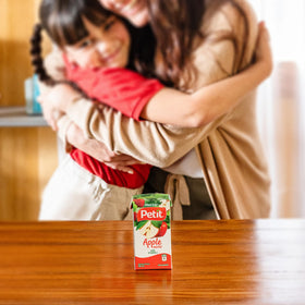 Petit Apple Nectar cartons on pantry shelf ideal for school lunches