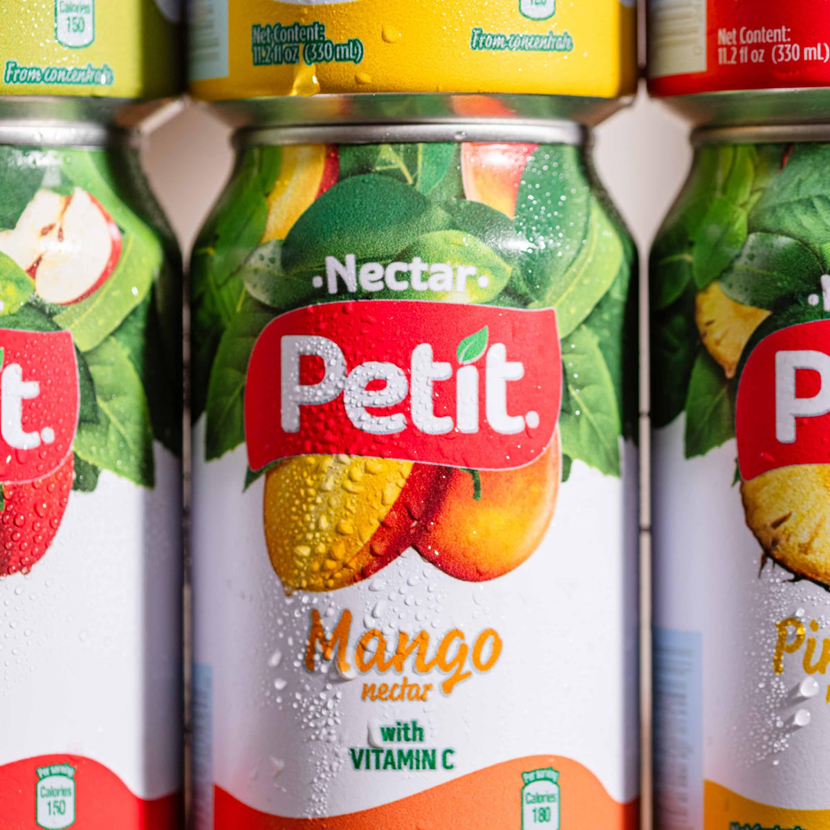Petit Mango Nectar 24-pack on shelf, perfect for gatherings