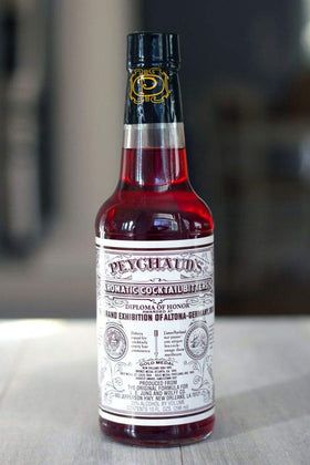 Peychaud's Aromatic Bitters label close-up suitable for gourmet recipes.