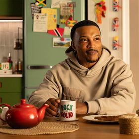 Steaming cup beside PG Tips boxes, suggesting a reliable daily routine.
