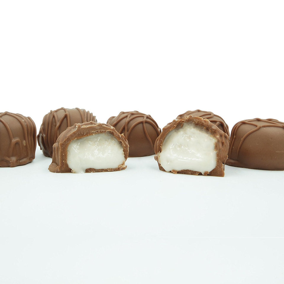 Philadelphia Candies vanilla creams in milk chocolate gift box, ideal for celebrations.