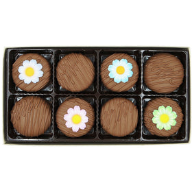 Philadelphia Candies Milk Chocolate OREO decorated daisy cookie display, perfect party treat.