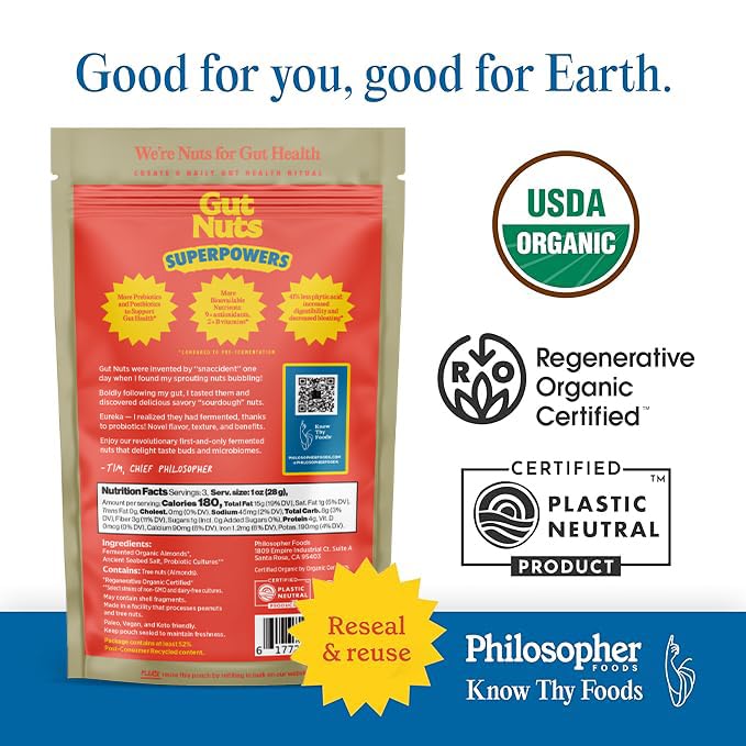 Philosopher Foods Gut Nuts resealable pouch on a desk, perfect for office snacking.
