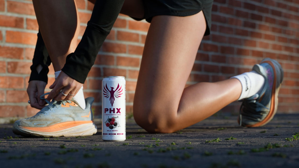 PHX 12 oz can in wild berry flavor for a fruity pick-me-up.