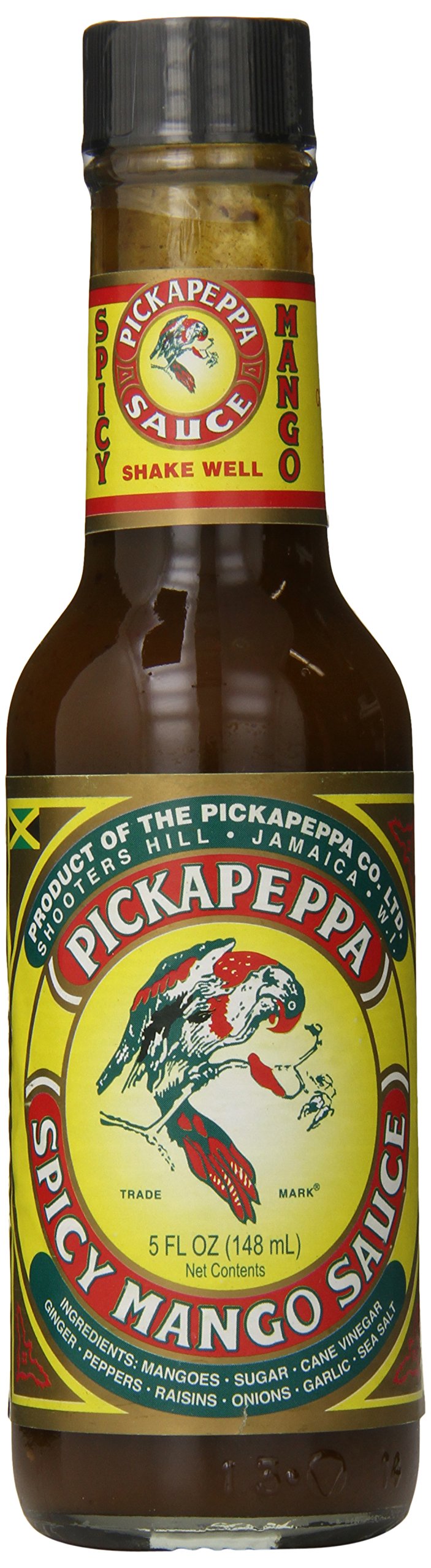 Pickapeppa Mango Spicy bottle showing tropical flavor for grilled meats