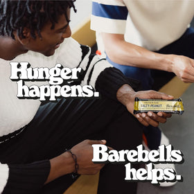 PickN Buy Barebell protein bar milk chocolate coating and peanuts.