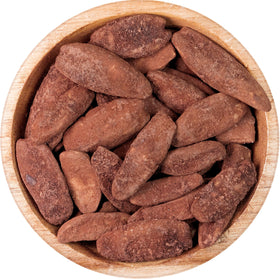 Pili Hunters close-up of pili nuts highlights rich texture and natural protein.