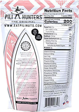 Pili Hunters pili nuts with pink Himalayan salt, close-up of seasoned crunch.