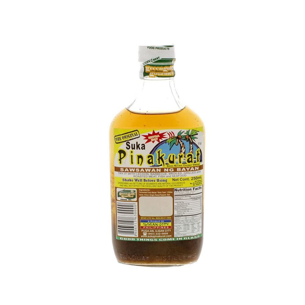 Pinakurat Original Extra Hot bottle label close-up highlighting coconut vinegar seasoning for meats.