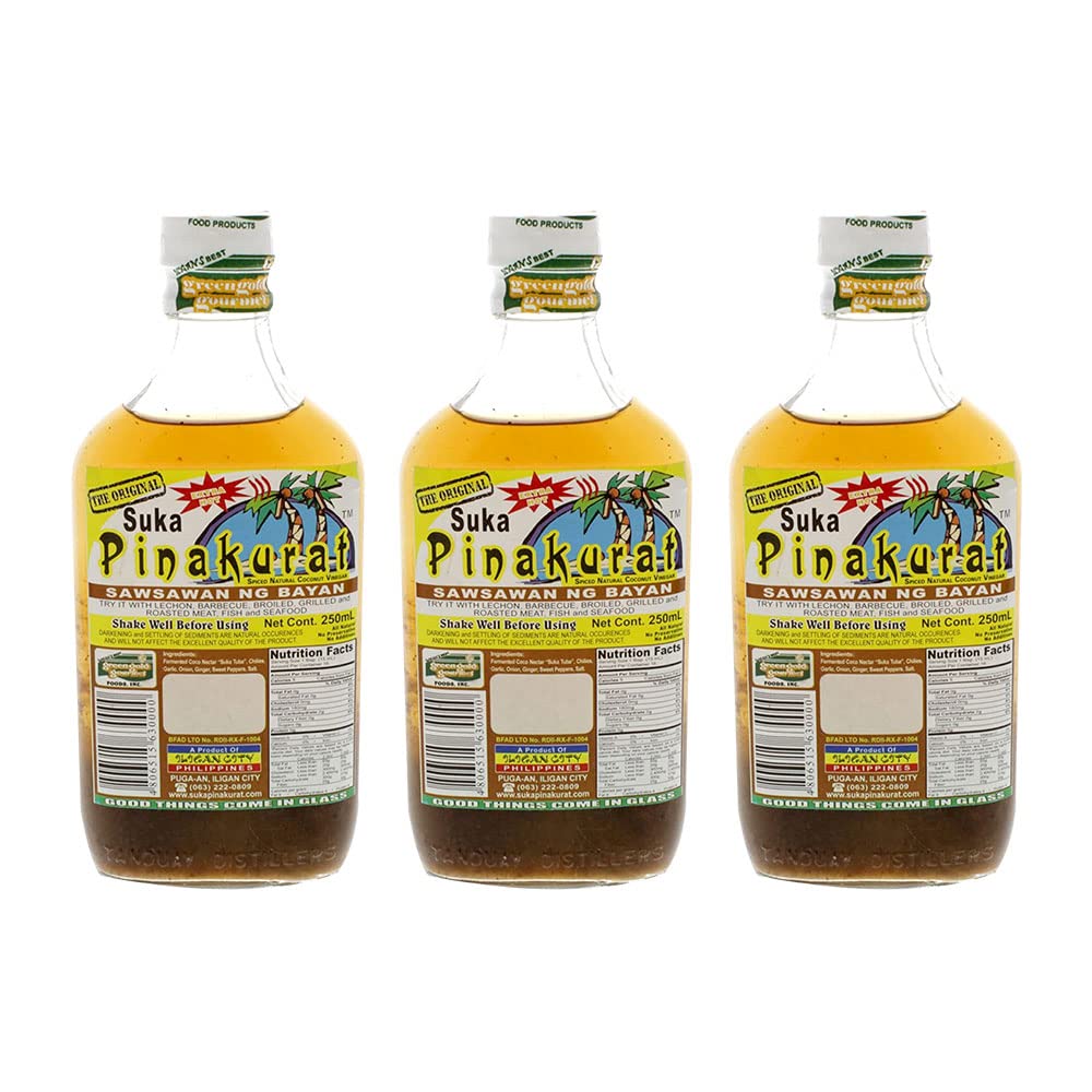 Pinakurat Original Extra Hot bottle pour showing spicy, balanced flavor for dipping and grilling.